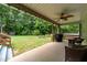 A view from the back porch of the swing set and spacious backyard at 123 Terawood Farm Dr, Willow Springs, NC 27592