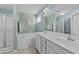 The spacious bathroom has dual sinks, a soaking tub, and a tiled walk-in shower at 123 Terawood Farm Dr, Willow Springs, NC 27592