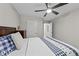 Comfortable bedroom featuring a full-size bed, ceiling fan, and a closet at 123 Terawood Farm Dr, Willow Springs, NC 27592