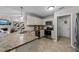 Well-equipped kitchen with stainless steel appliances, granite counters, and an open layout for easy entertaining at 123 Terawood Farm Dr, Willow Springs, NC 27592
