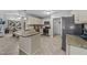 Well-equipped kitchen with stainless steel appliances, granite counters, and an open layout for easy entertaining at 123 Terawood Farm Dr, Willow Springs, NC 27592