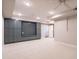 Finished basement offering built-in storage cabinets, open space and neutral flooring at 1313 Dale St, Raleigh, NC 27605