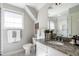 Bathroom featuring granite countertop, vanity, and shower with glass door at 1313 Dale St, Raleigh, NC 27605