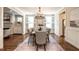 Inviting dining room with a chandelier, shuttered windows, and a neutral color palette, perfect for gatherings at 1313 Dale St, Raleigh, NC 27605