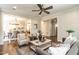 Spacious living room seamlessly connects to the dining area, offering an open concept layout perfect for entertaining at 1313 Dale St, Raleigh, NC 27605