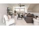 Stylish living room featuring a plush sectional sofa, modern decor, and ample natural light at 1313 Dale St, Raleigh, NC 27605