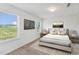 Light filled main bedroom features two windows with modern decor and neutral carpet at 140 Camel Crazies Pl # 39, Lillington, NC 27546