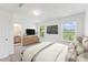 This bright main bedroom features a connected bathroom, a TV and two windows at 140 Camel Crazies Pl # 39, Lillington, NC 27546