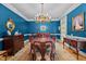 Formal dining room with elegant chandelier and sophisticated decor at 191 Nc 56, Louisburg, NC 27549