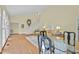 Inviting living room with hardwood floors, vaulted ceiling, and bright natural light at 191 Nc 56, Louisburg, NC 27549