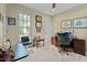 Comfortable home office space with a large window and built-in desk, perfect for remote work or study at 191 Nc 56, Louisburg, NC 27549