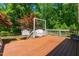 Wood deck overlooking backyard with shed and swing at 2100 Fort Dr, Clayton, NC 27520