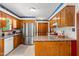 Well-lit kitchen with stainless steel appliances and ample counter space at 2100 Fort Dr, Clayton, NC 27520