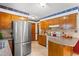 Charming kitchen with stainless appliances and wood cabinets and countertops at 2100 Fort Dr, Clayton, NC 27520