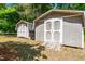 Two sheds in the backyard, perfect for storing outdoor equipment, with easy access through wide doors at 2100 Fort Dr, Clayton, NC 27520