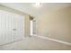 Bedroom featuring a double door closet at 217 Braxcarr St, Holly Springs, NC 27540