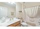 Full bathroom with a shower-tub combination, a vanity with sink, and neutral decor at 221 Mayfield Dr, Apex, NC 27539