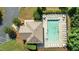 Aerial view of the community pool with ample lounge chairs and a well-maintained deck at 24 Sweet Birch Row, Youngsville, NC 27596
