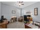 Comfortable home office with chair, desk and neutral carpet at 24 Sweet Birch Row, Youngsville, NC 27596
