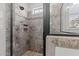 Walk-in shower with niche and tiled walls at 24 Sweet Birch Row, Youngsville, NC 27596