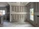 Bright dining area featuring large windows and open to the kitchen, perfect for entertaining and Gathering meals at 240 Green Pines Estates Dr, Kenly, NC 27542