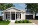 Charming single-story home with a covered front porch and black shutters at 240 Green Pines Estates Dr, Kenly, NC 27542