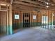 View of an unfinished living space, showing framing and some wall coverings at 240 Green Pines Estates Dr, Kenly, NC 27542