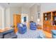 Well-lit living room with hardwood floors, comfortable seating, and open layout, perfect for entertaining guests at 313 Helmsdale Dr, Chapel Hill, NC 27517