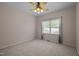 Bedroom with carpeted floors and large window at 3653 Range Rd, Stem, NC 27581