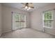 Bedroom with natural light and carpeted floors at 3653 Range Rd, Stem, NC 27581