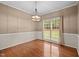 Dining room with natural lighting, chandelier and hardwood floors at 3653 Range Rd, Stem, NC 27581