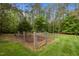 Enclosed garden area, offering a dedicated space for growing flowers, vegetables, or herbs at 3653 Range Rd, Stem, NC 27581