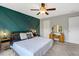 Bright bedroom showcasing decorative accent wall, plush carpet, and ample natural light at 45 Iris Dr, Youngsville, NC 27596