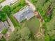 Overhead view of a home showcasing mature greenery, landscaped yard and well maintained grounds at 4830 North Hills, Raleigh, NC 27612