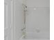 Classic bathroom featuring white subway tile, a shower, and gold fixtures at 4830 North Hills, Raleigh, NC 27612