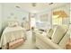 Cozy bedroom features two twin beds, and a comfortable armchair, perfect for a peaceful night's sleep at 5021 Lansdowne Dr, Durham, NC 27712