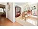 Formal dining area showcasing natural light, elegant decor, and a stylish transition into other areas of the home at 5021 Lansdowne Dr, Durham, NC 27712