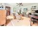 Comfortable living room with light toned walls and an antique hutch for storage and display at 5021 Lansdowne Dr, Durham, NC 27712