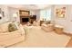 Inviting living room with comfortable seating, a fireplace, and plenty of natural light at 5021 Lansdowne Dr, Durham, NC 27712