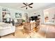 Cozy living room featuring neutral tones, built-in bookshelves, and comfortable seating at 5021 Lansdowne Dr, Durham, NC 27712