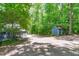 Large backyard featuring a shed with mature trees offering privacy and shade at 603 Gentry Ln, Hillsborough, NC 27278
