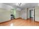 Bedroom showcases hardwood flooring, natural light, decorative moulding, and a modern ceiling fan at 603 Gentry Ln, Hillsborough, NC 27278