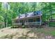 Charming home with inviting front porch, manicured landscaping and dormer windows at 603 Gentry Ln, Hillsborough, NC 27278