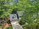 Aerial view of home featuring mature trees and landscaped yard at 640 St Vincent Dr, Holly Springs, NC 27540