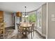 Bright breakfast nook with bay window and stainless steel appliances at 640 St Vincent Dr, Holly Springs, NC 27540