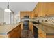 Charming kitchen with an island and lots of countertop space at 640 St Vincent Dr, Holly Springs, NC 27540