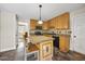 Charming kitchen with an island and a view into the dining room at 640 St Vincent Dr, Holly Springs, NC 27540