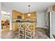 Charming kitchen with an island and stainless steel appliances at 640 St Vincent Dr, Holly Springs, NC 27540