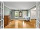 Comfortable living room with hardwood floors, neutral paint, and plenty of natural light at 640 St Vincent Dr, Holly Springs, NC 27540