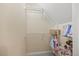 Well-organized walk-in closet with shelving, hanging rods, and ample storage space at 640 St Vincent Dr, Holly Springs, NC 27540